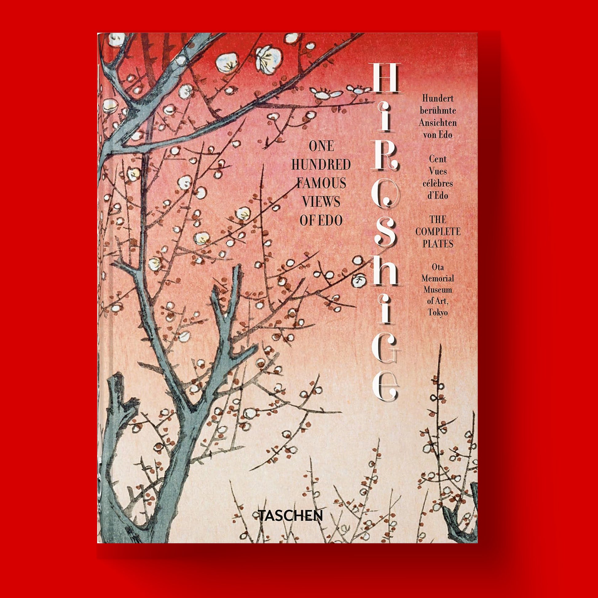 Hardcover art book cover for "One Hundred Famous Views of Edo" by Utagawa Hiroshige, a Taschen publication featuring a beautiful Japanese ukiyo-e plum blossom print.