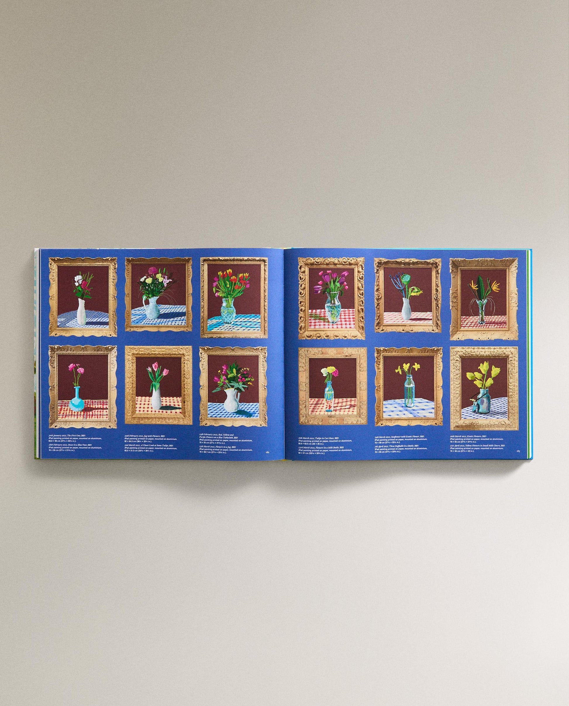 David Hockney book open to a page with multiple small images of vases on a table.