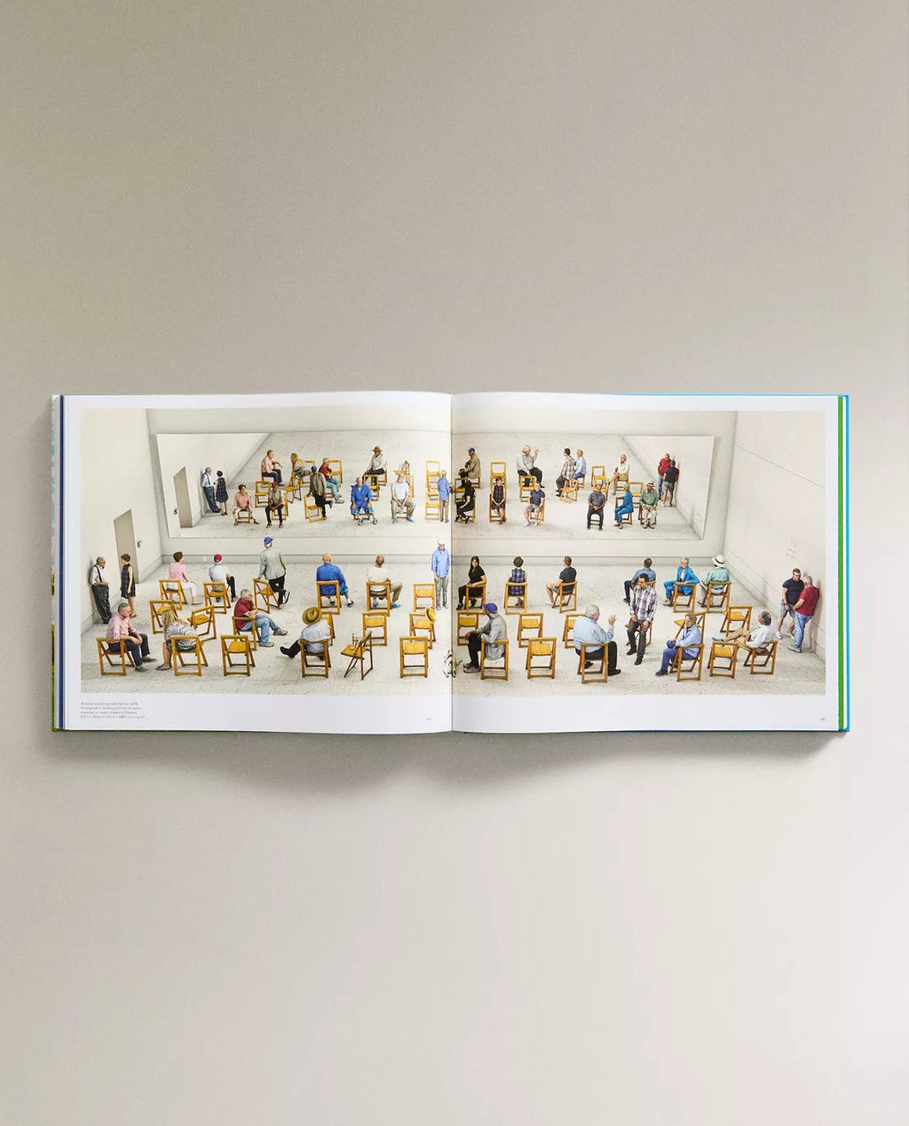 Open David Hockney book showing a detailed illustration of people in a classroom setting.