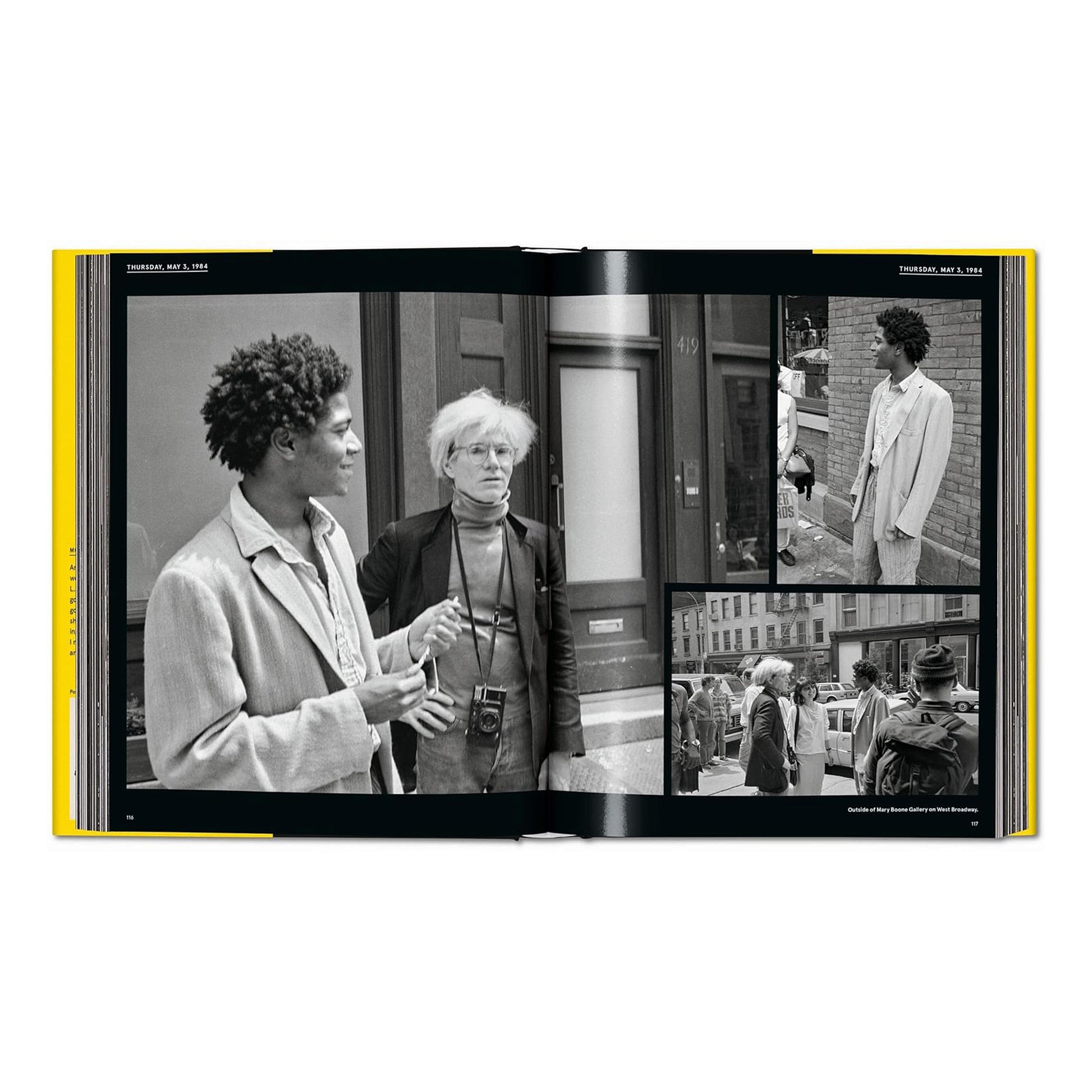 A two-page spread featuring black and white photographs of Andy Warhol and Jean-Michel Basquiat outside the Mary Boone Gallery in New York City.