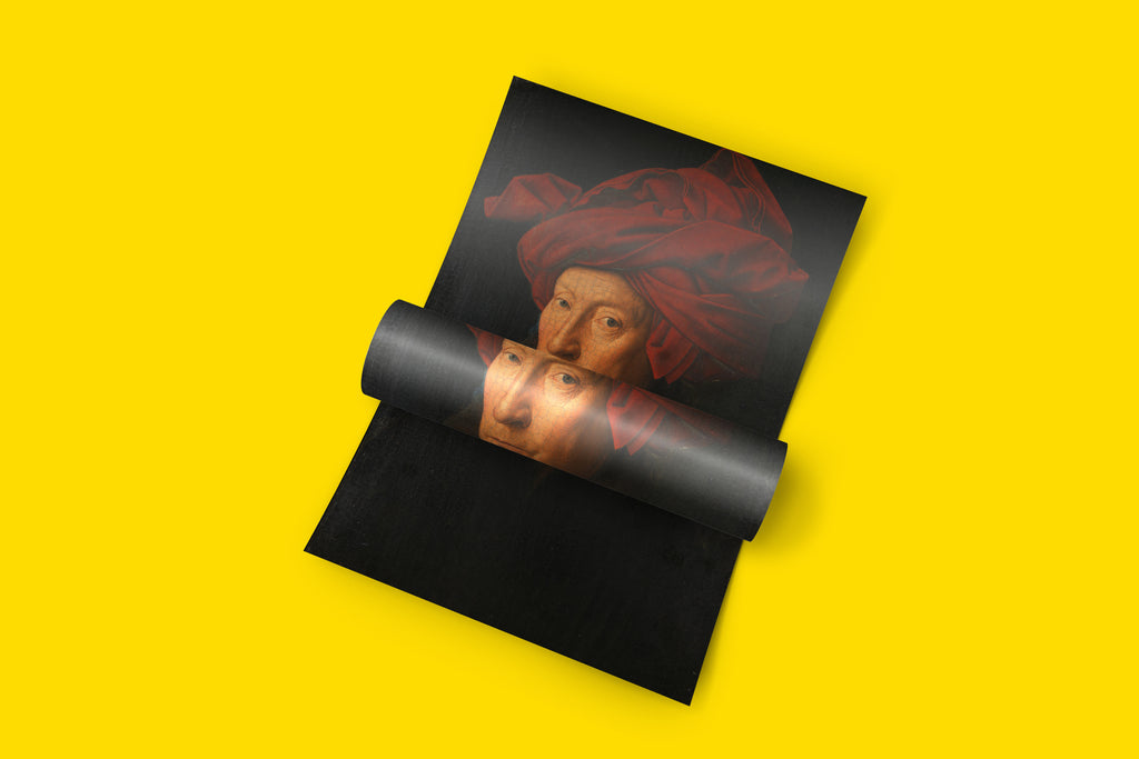 Detail of the Jan van Eyck 'Portrait of a Man' art print showing the artist's signature red turban and realistic features on FSC-certified paper.