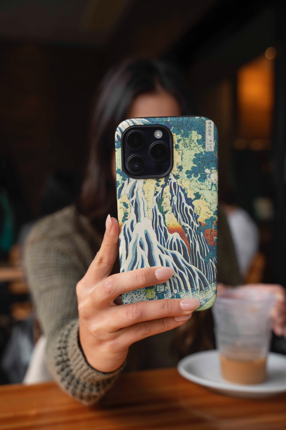 ARTSNOB phone case displaying a high-quality reproduction of Hokusai's "The Kirifuri Waterfall at Mt. Kurokami," highlighting its artistic design and compatibility with wireless charging.