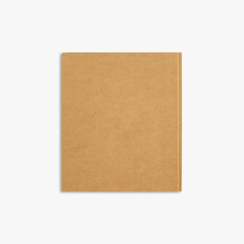 Thames and Hudson Banksy The Prints hardback art book cover showing minimalist kraft paper design with yellow sticker label documenting over 170 unique prints from 2002 to 2022