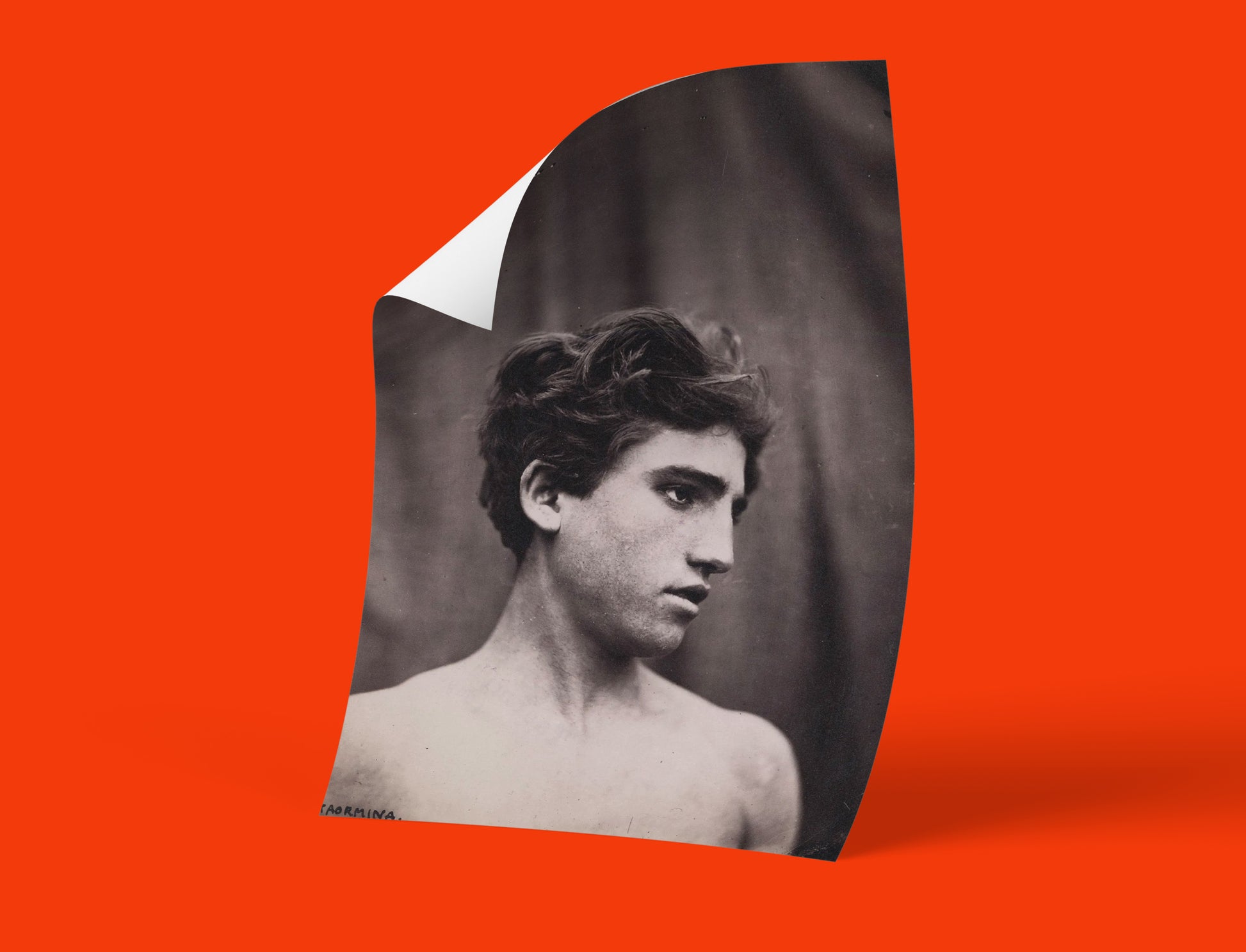 Black and white vintage wall art featuring a serene portrait of a young man by Wilhelm von Gloeden