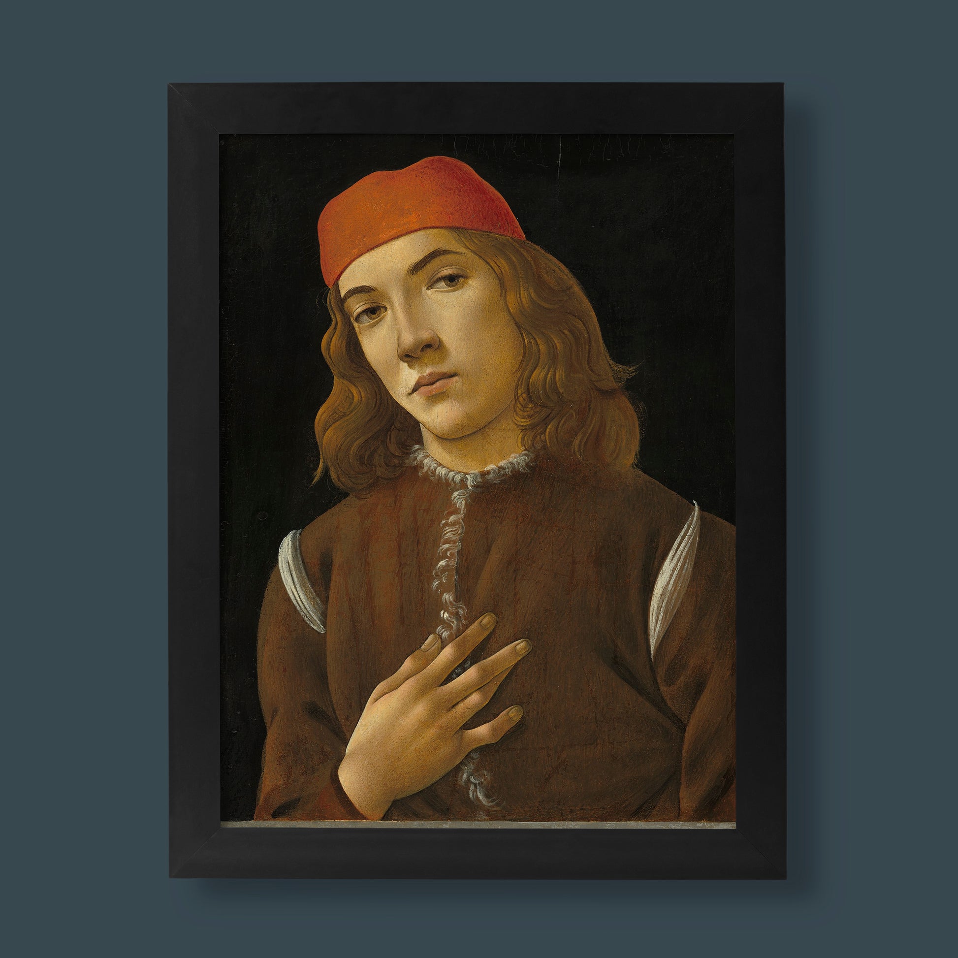Sandro Botticelli Portrait of a Young Man fine art print, Renaissance portrait wall art with rich red cap and russet tunic, giclée art print by ART SNOB