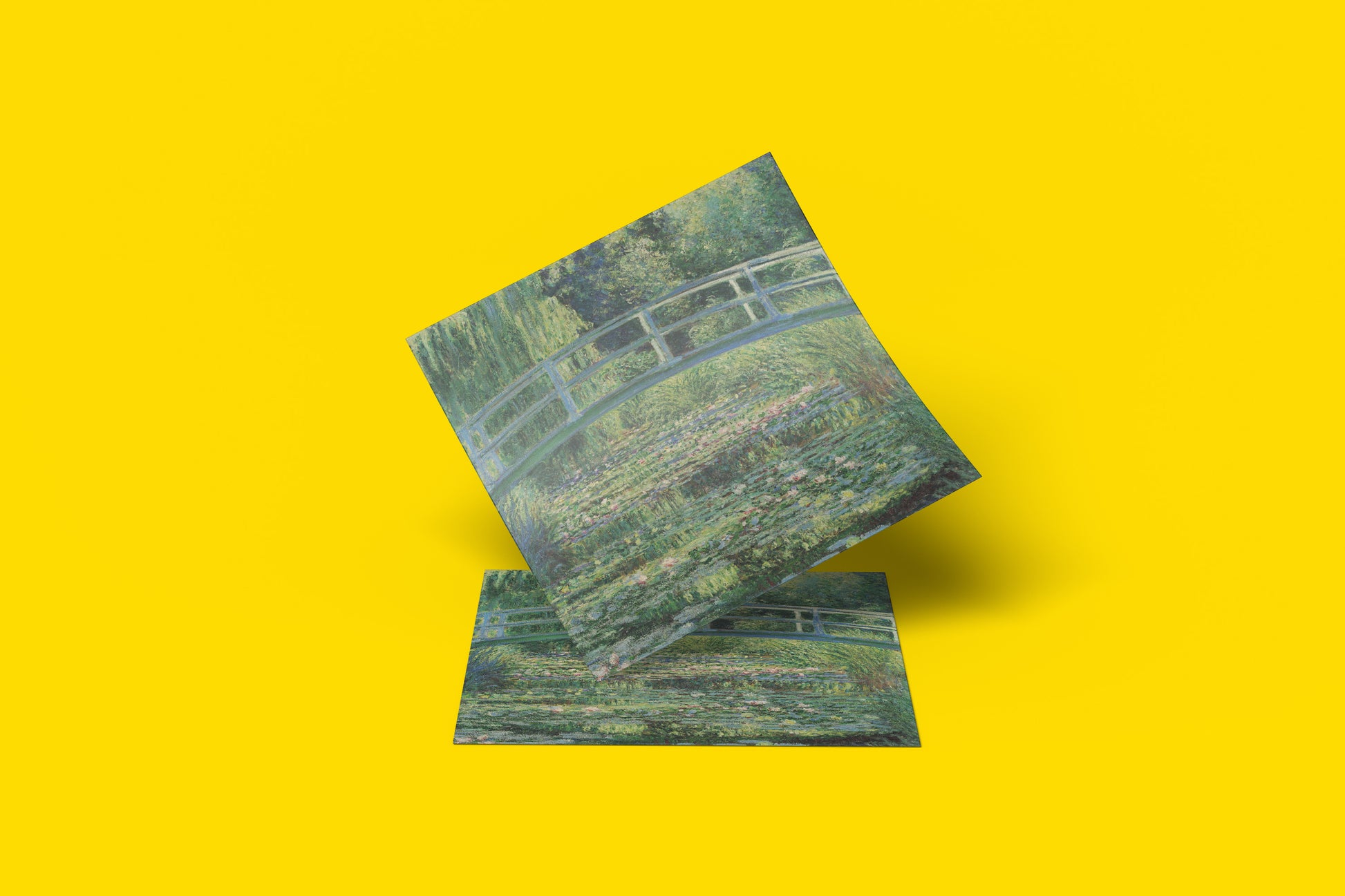 High-definition fine art print of Claude Monet's famous painting of a water lily pond with a Japanese-style bridge.