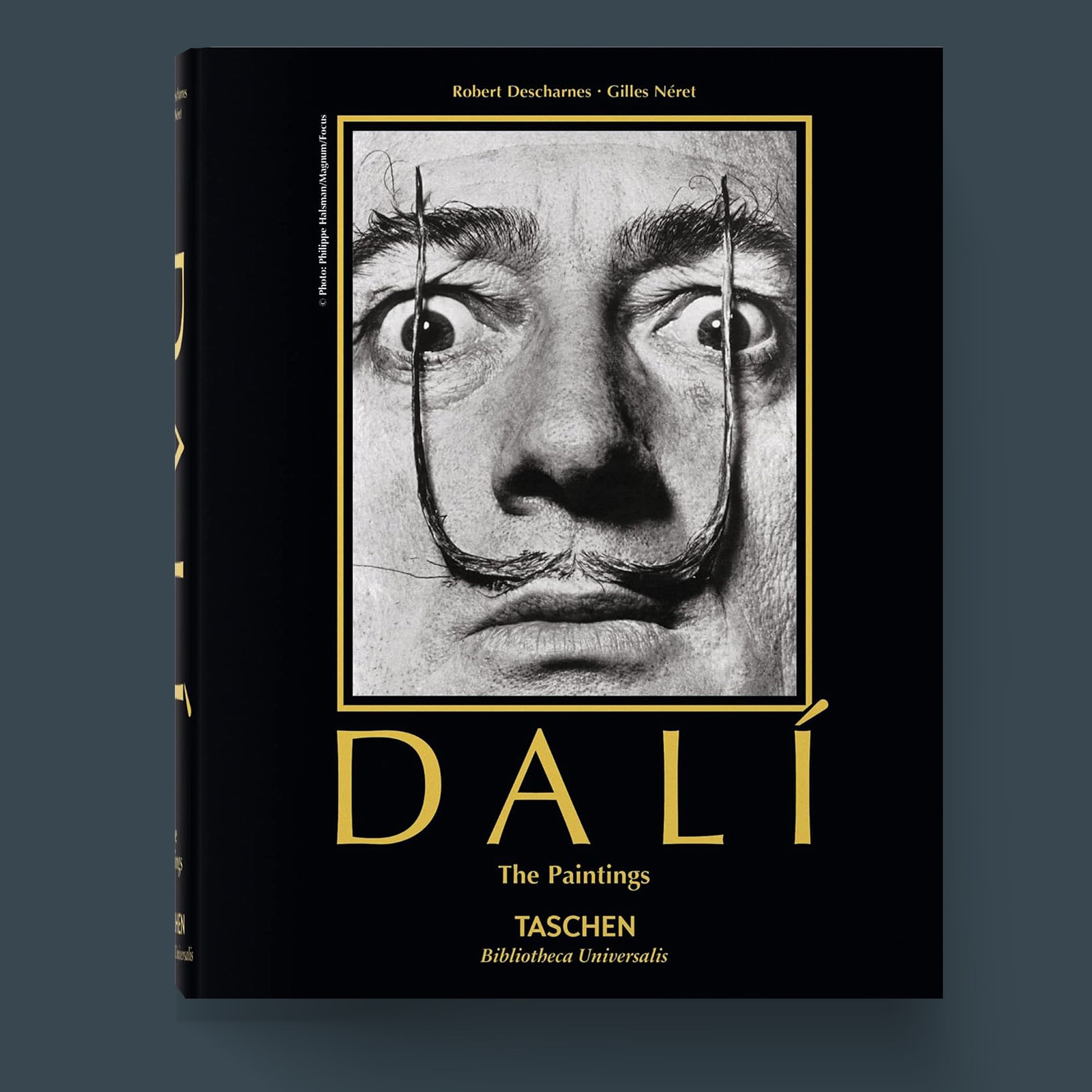 Salvador Dalí, surrealist painter, on the cover of a TASCHEN fine art book.