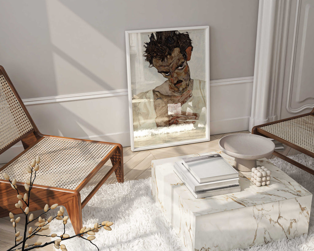 Designer wall art featuring a framed Egon Schiele Expressionist print, creating an elegant focal point in a high-end living space.