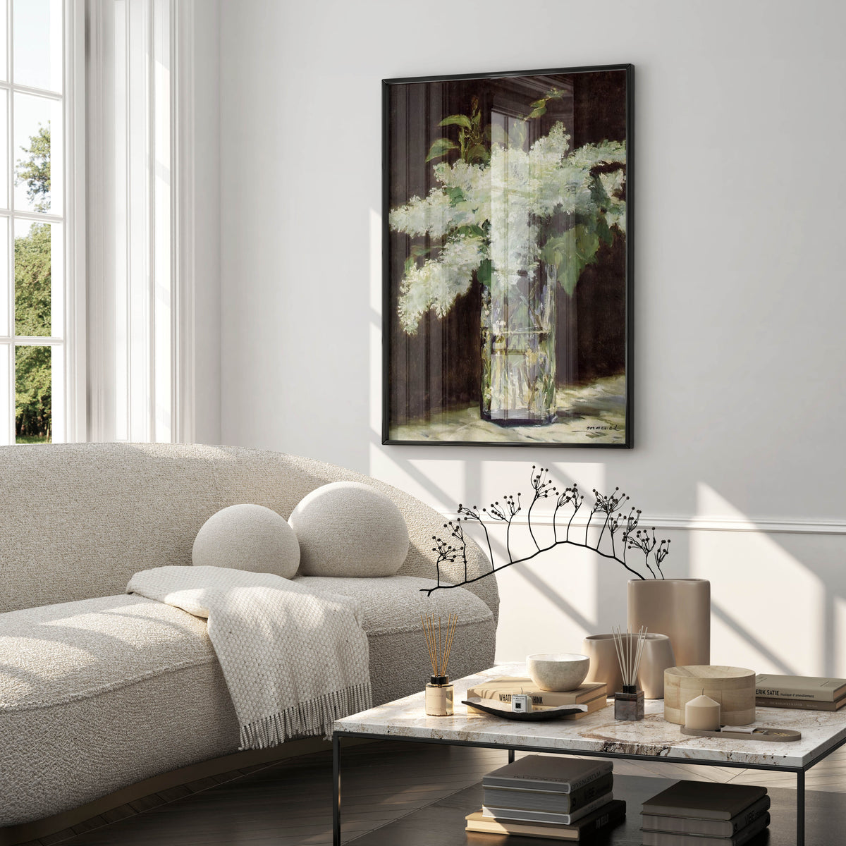 Framed Édouard Manet White Lilac art print displayed above a sofa in a modern living room