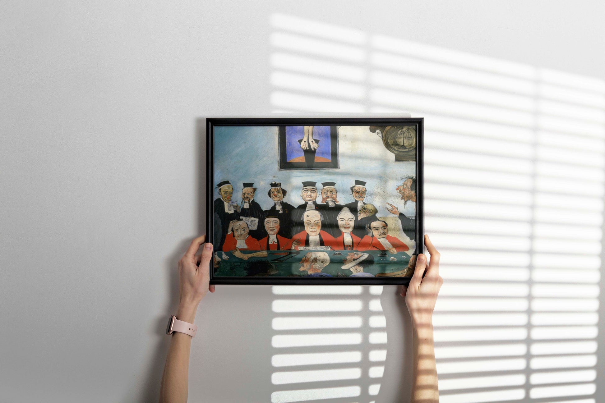 Framed reproduction of Ensor's Good Judges painting hanging as wall art in modern interior, museum-quality framed fine art print perfect for living room or office