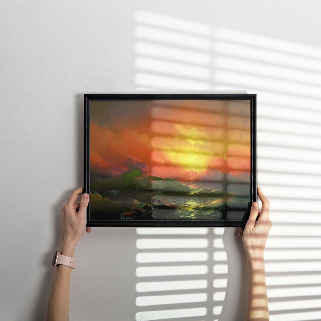Framed reproduction of Ivan Aivazovsky's The Ninth Wave masterpiece hanging as sophisticated wall decor, featuring luminous ocean waves and shipwreck scene in home setting