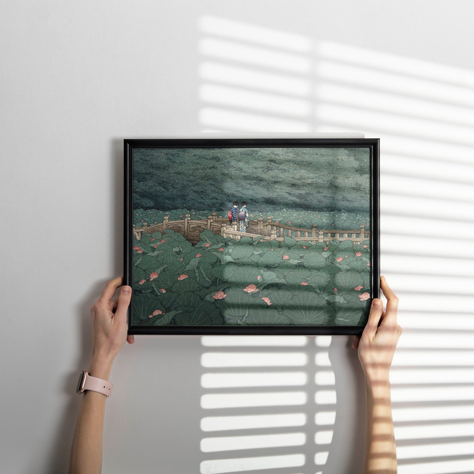 Japanese fine art print by Hasui Kawase elegantly framed as wall decor showing vintage woodblock landscape of lotus flowers and kimono clad figures at Benten Shrine Tokyo