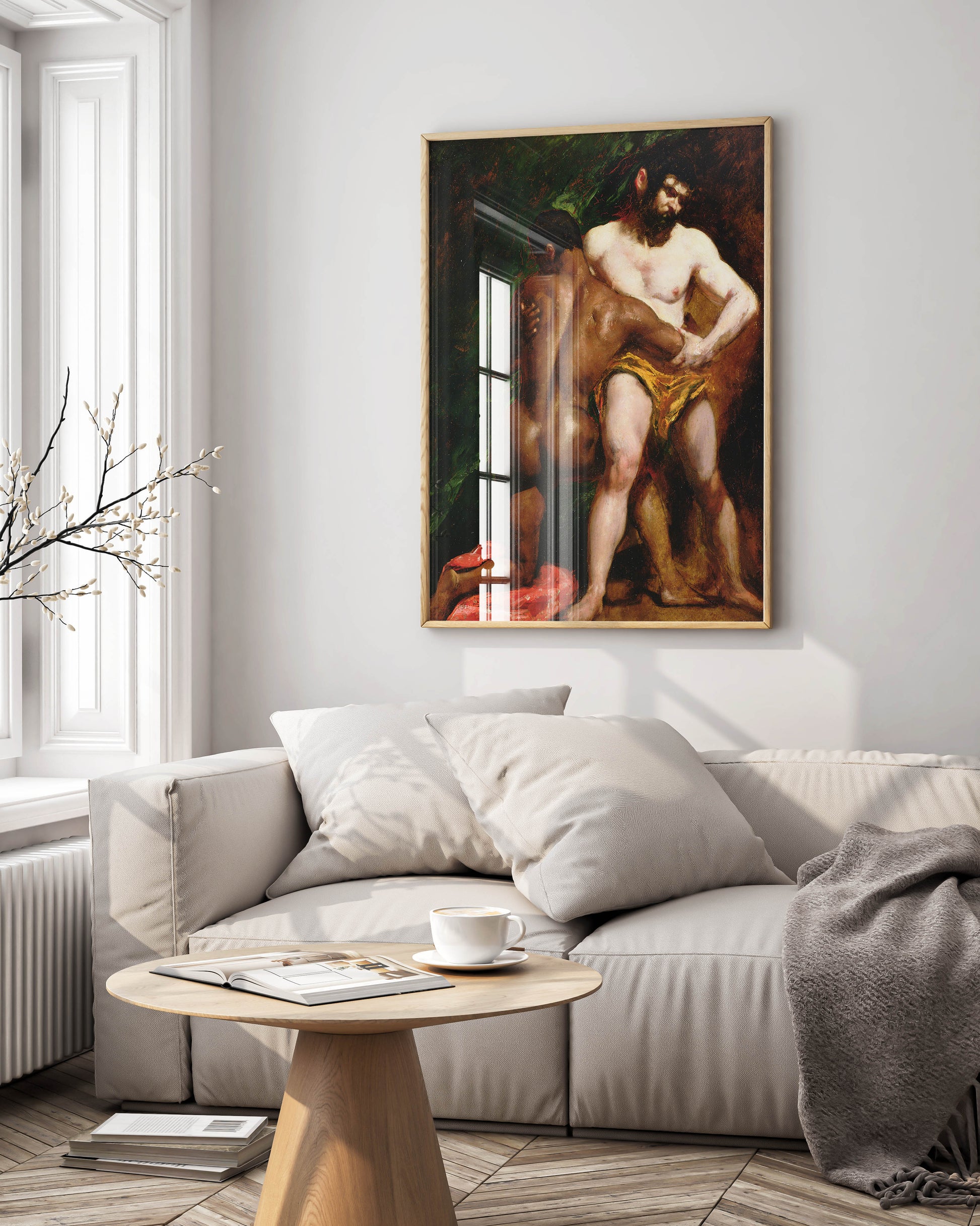 Living room with a classical painting of a nude figure on the wall above a sofa.