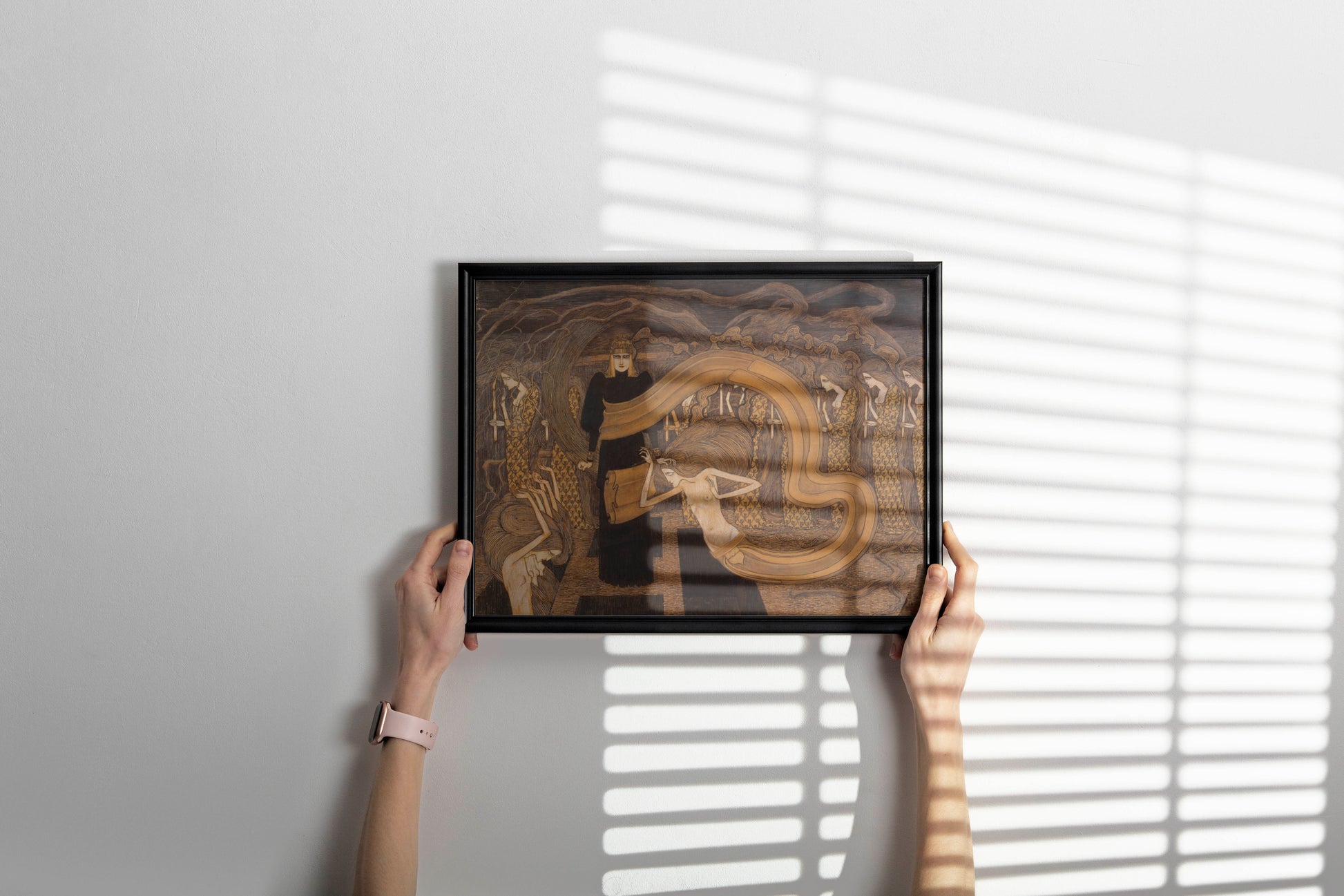 Framed symbolist wall art print of Jan Toorop's Fatalism hanging in stylish interior setting, showing museum-quality giclee reproduction with elegant frame for sophisticated home gallery and art collection display