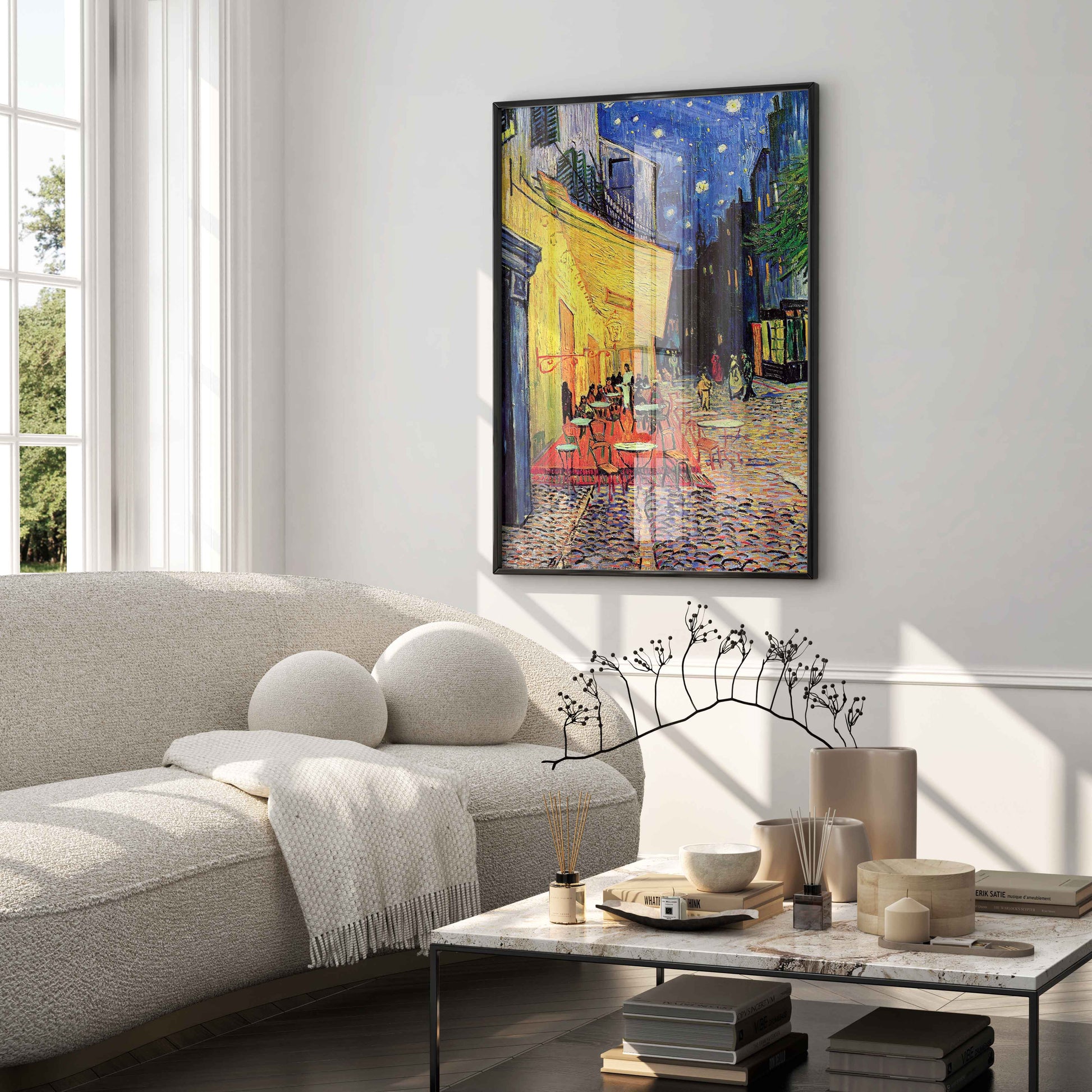 Framed Vincent van Gogh Café Terrace at Night art print displayed in a luxury interior design setting