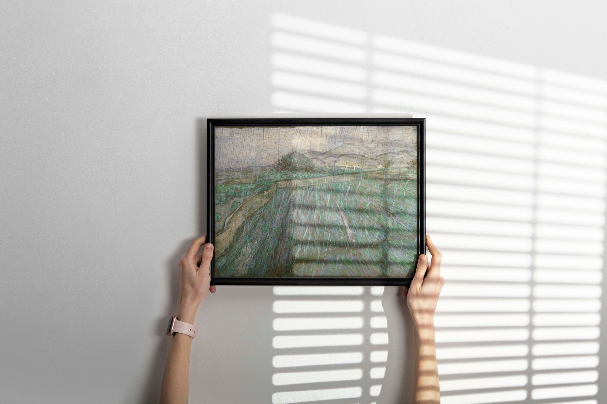 A framed art print of Vincent van Gogh’s ‘Rain’ painting, shown as stylish wall art for home decor.