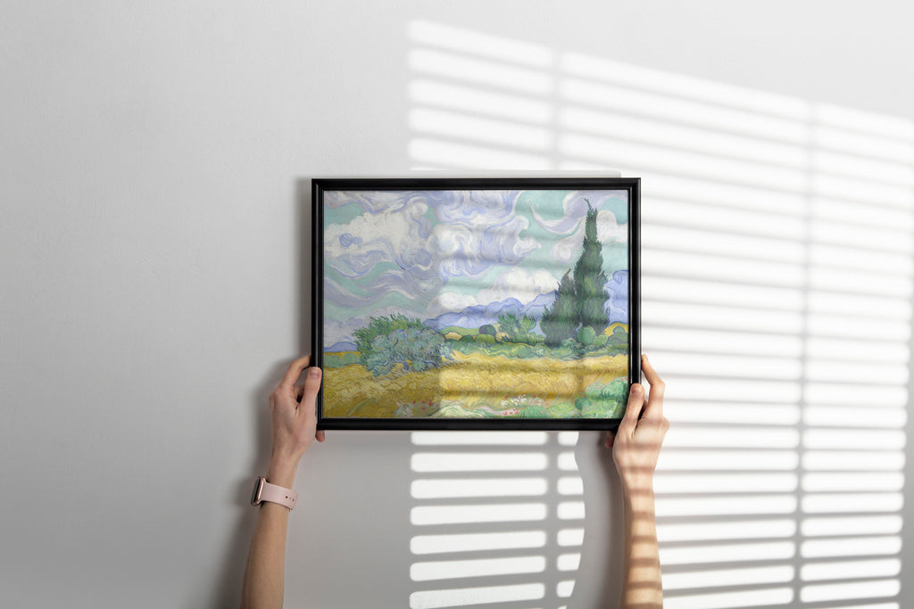 A close-up shot of a museum-quality framed Van Gogh giclée print, hanging in a beautifully designed living room, highlighting its use as luxury home decor.