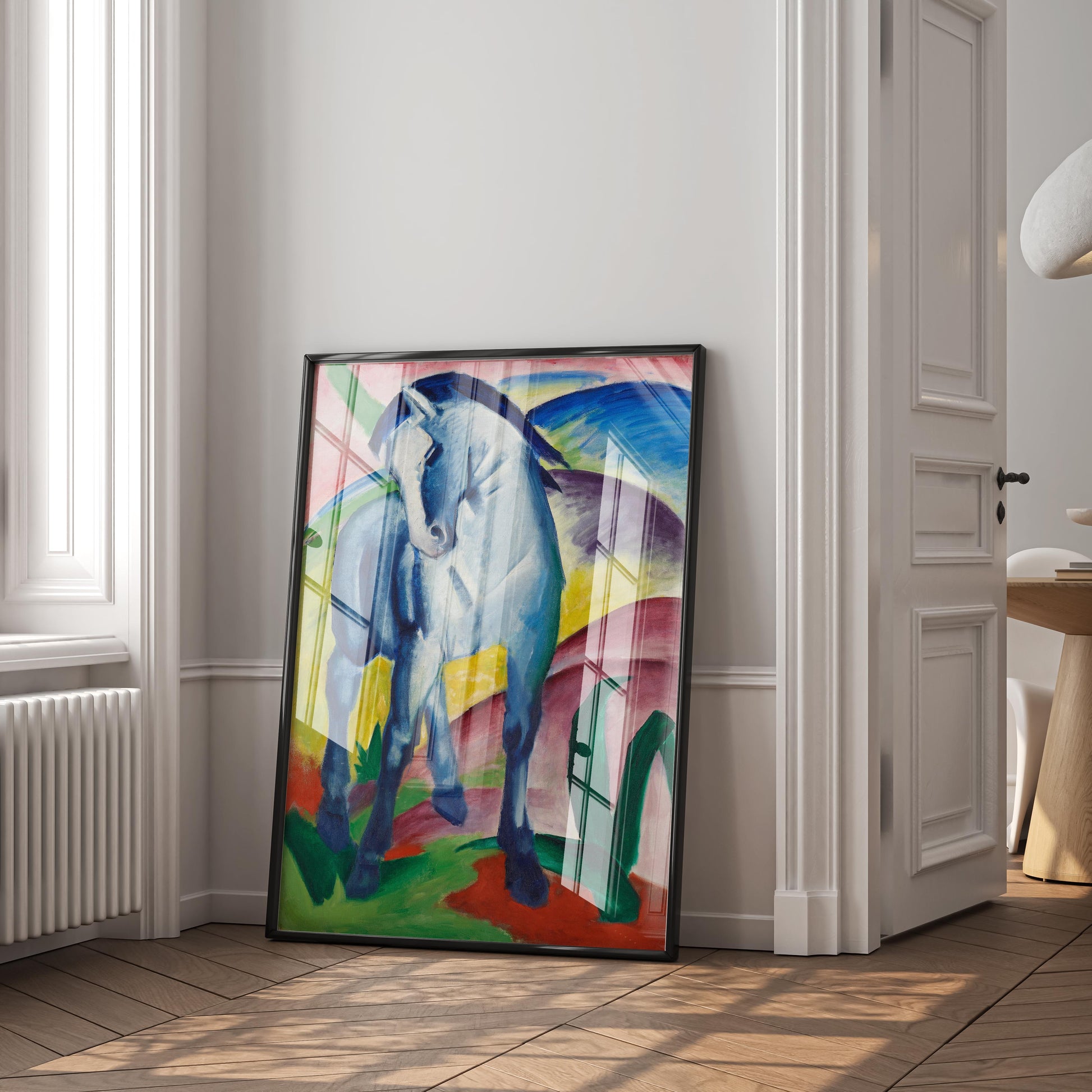 Franz Marc Blue Horse I framed fine art print in modern interior, Expressionist horse painting, Der Blaue Reiter wall art, contemporary home decor, vibrant art for living room, large framed prints