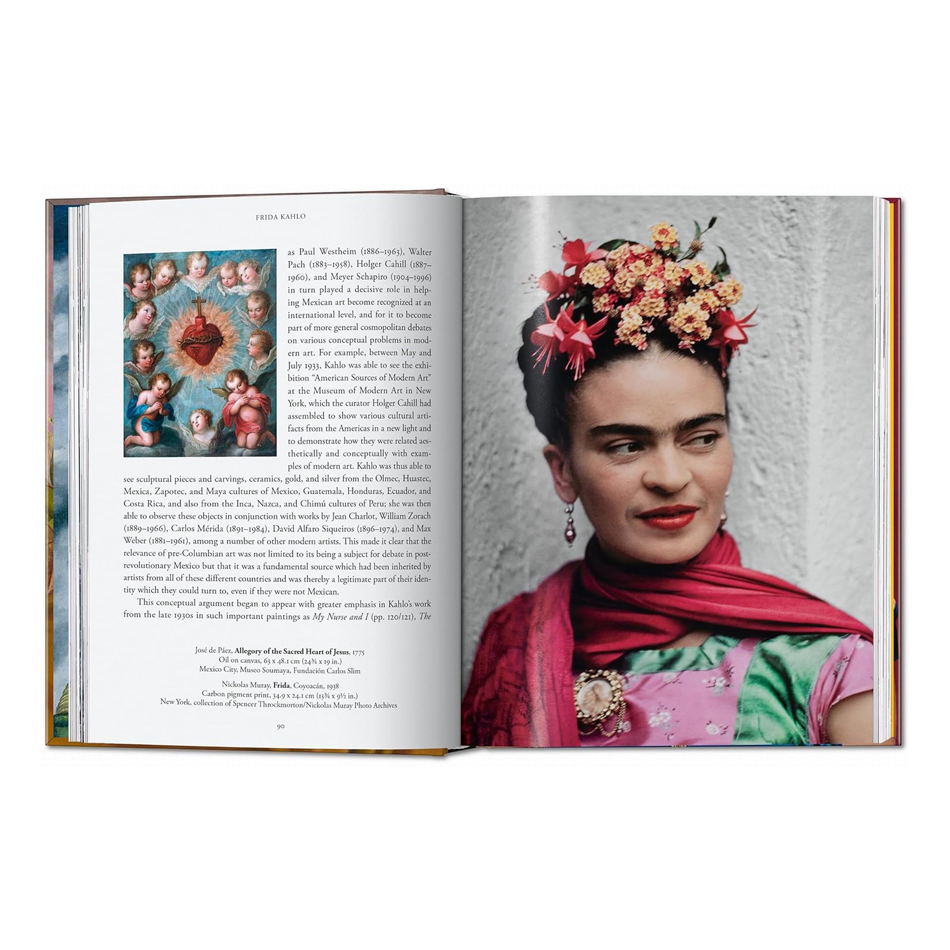 A beautiful open spread from the TASCHEN art book showing a close up of a Frida Kahlo photograph and a facing page with a detailed text on the Mexican artist's life and work.