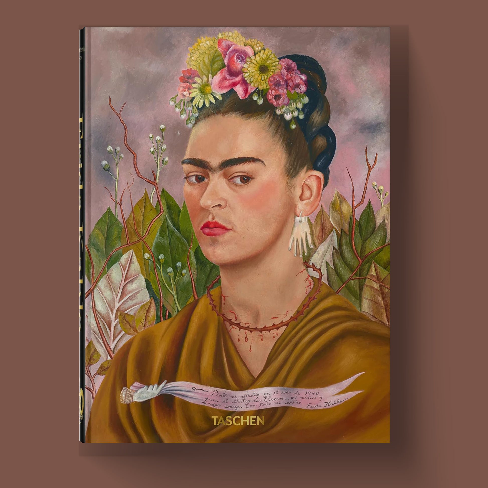 The front cover of the TASCHEN hardcover art book, featuring Frida Kahlo's iconic painting "The Wounded Deer", a key piece in her fine art portfolio.