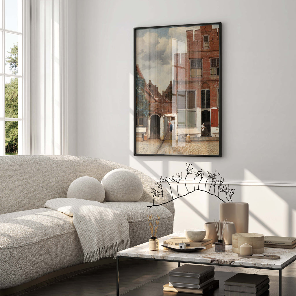 Stunning high-end print of Vermeer's 'The Little Street' serving as a sophisticated focal point in a well-appointed luxury living room interior design.