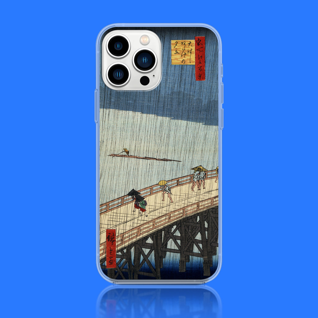 A detailed close-up of the ARTSNOB phone case featuring the Japanese woodblock print, 'Sudden Shower over Shin-Ōhashi Bridge and Atake' by Utagawa Hiroshige.