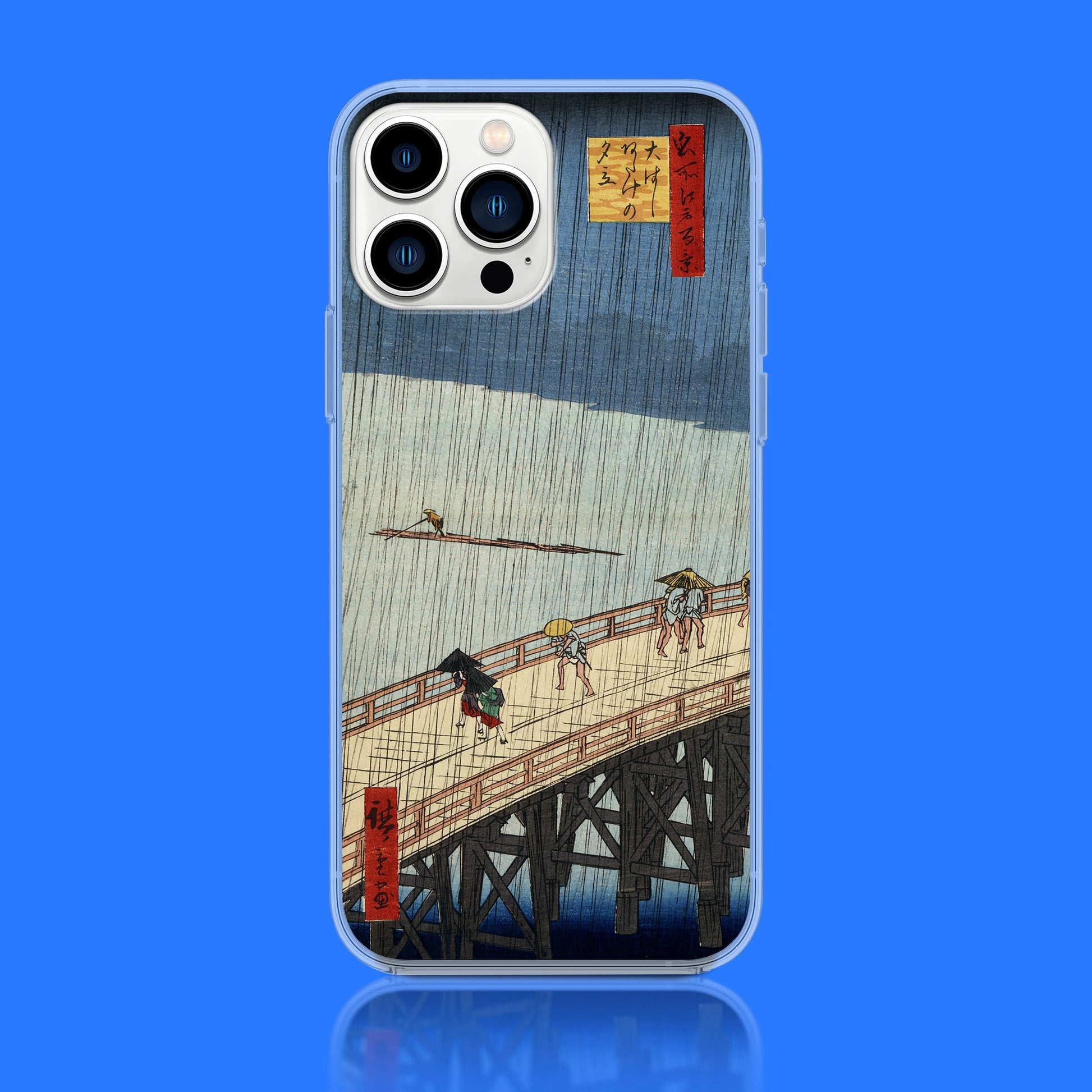 A detailed close-up of the ARTSNOB phone case featuring the Japanese woodblock print, 'Sudden Shower over Shin-Ōhashi Bridge and Atake' by Utagawa Hiroshige.