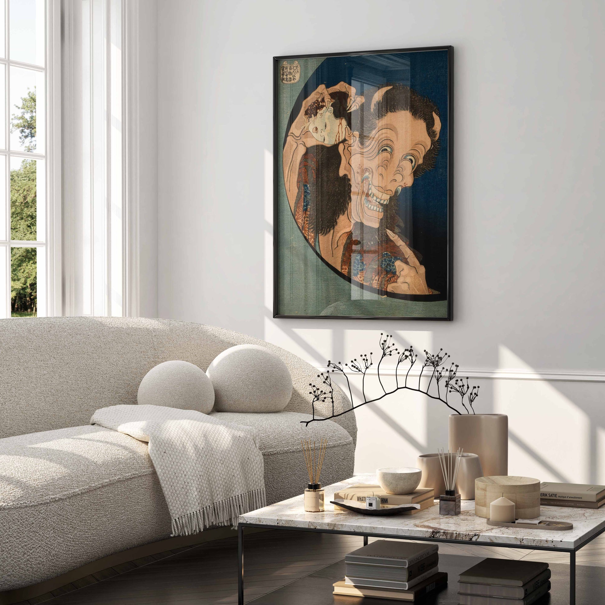 Luxury living room interior featuring framed Japanese wall art by Hokusai — The Laughing Hannya — as a bold statement piece.
