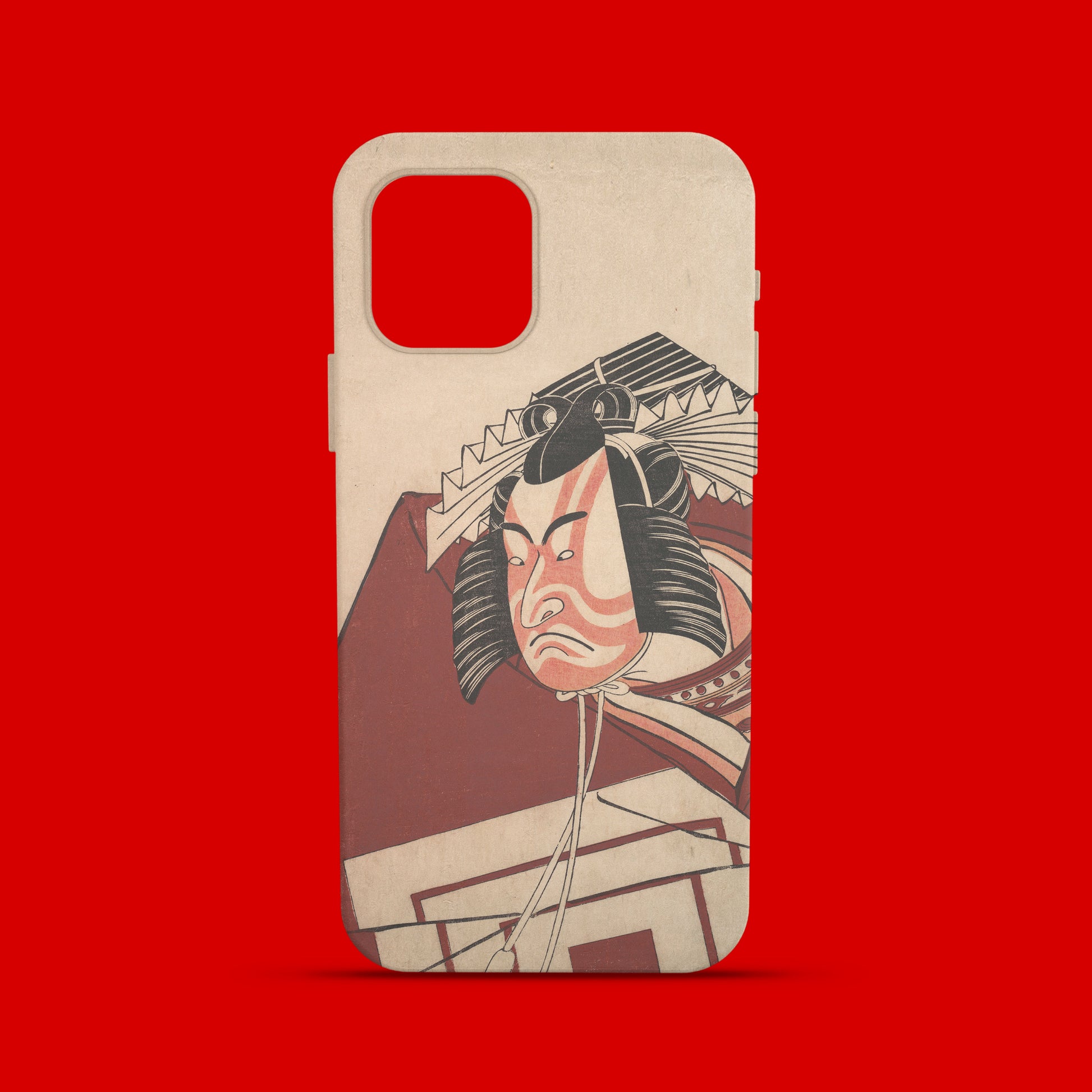 A phone case featuring an ukiyo-e woodblock print of the famous kabuki actor Ichikawa Monnosuke II in a Shibaraku performance. The print, by artist Shunkō, shows the actor in full makeup and an elaborate wig, wearing a persimmon red robe with the Ichikawa family crest.