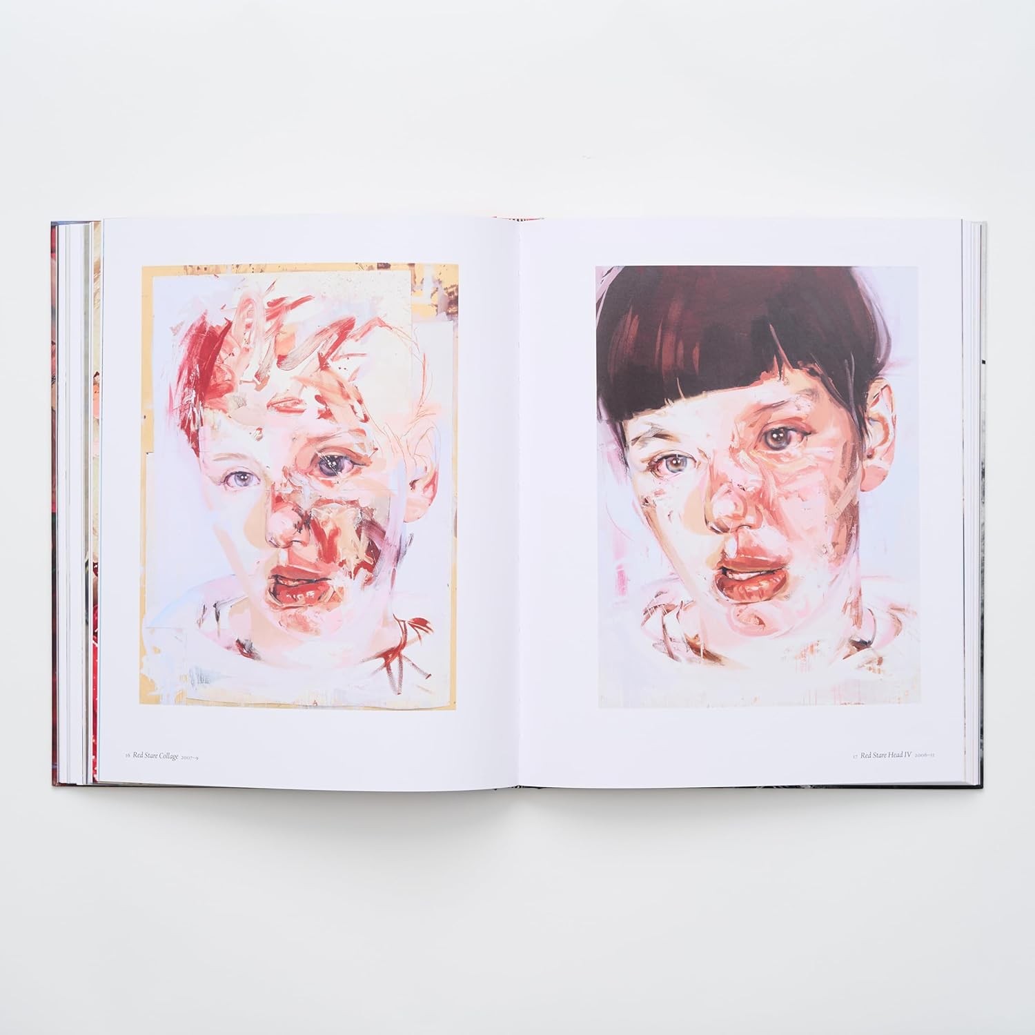 A double-page spread from the book featuring two Jenny Saville paintings side-by-side, titled 'Red Stare I' and 'Red Stare IV'. The images are expressive, almost abstract portraits, highlighting the artist's powerful approach to contemporary portraiture.
