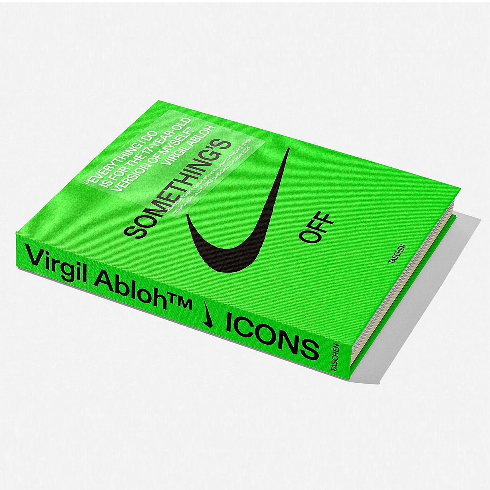 A horizontal view of the open spine of the "Virgil Abloh. Nike. ICONS" coffee table book, showcasing its unique Swiss binding and stacked pages.