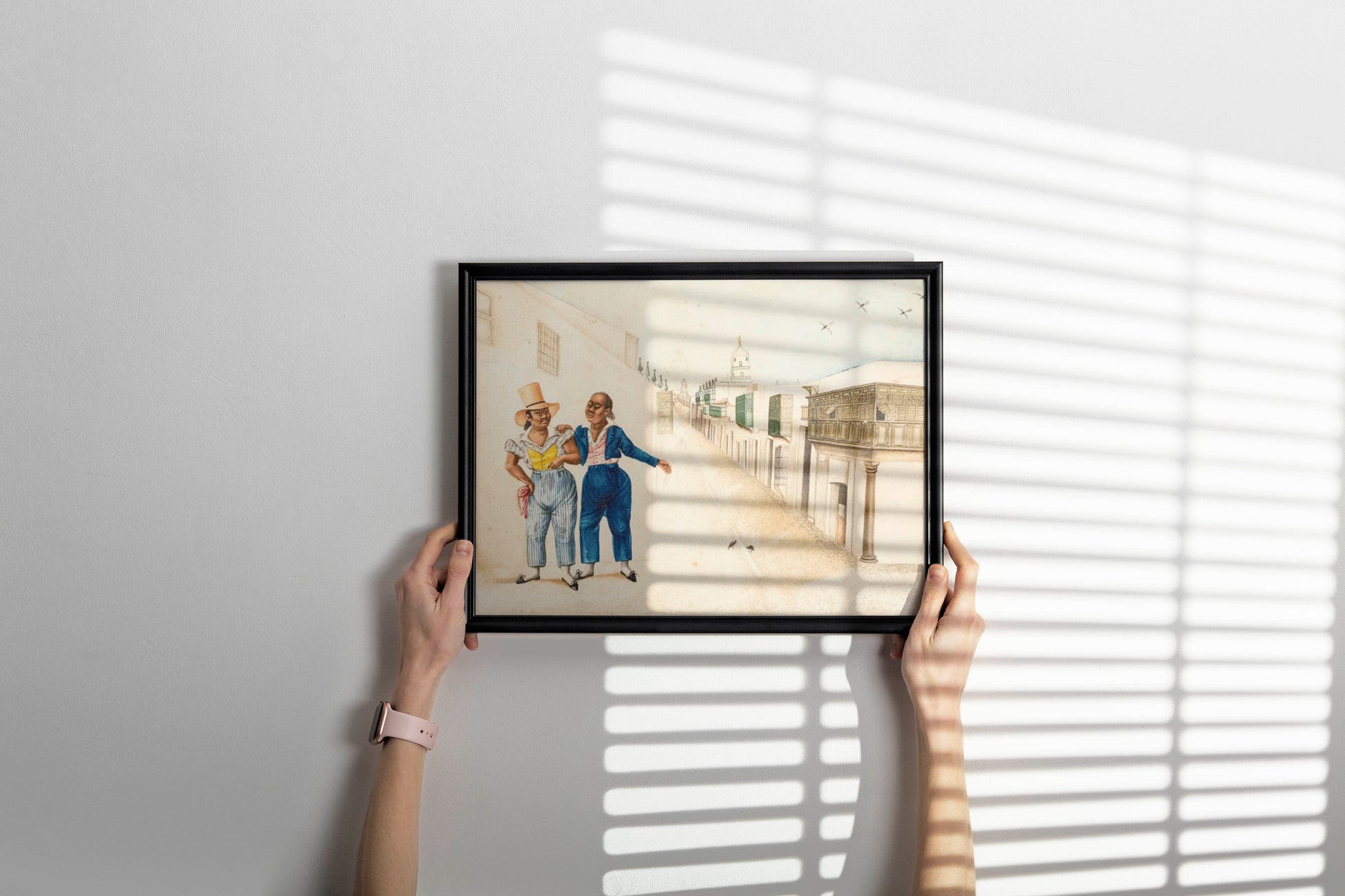 Interior design shot of a luxurious home, showcasing a stylishly framed wall art poster of the "Juan José Cabezudo and a Friend" print, adding a touch of historical elegance to the room's decor.
