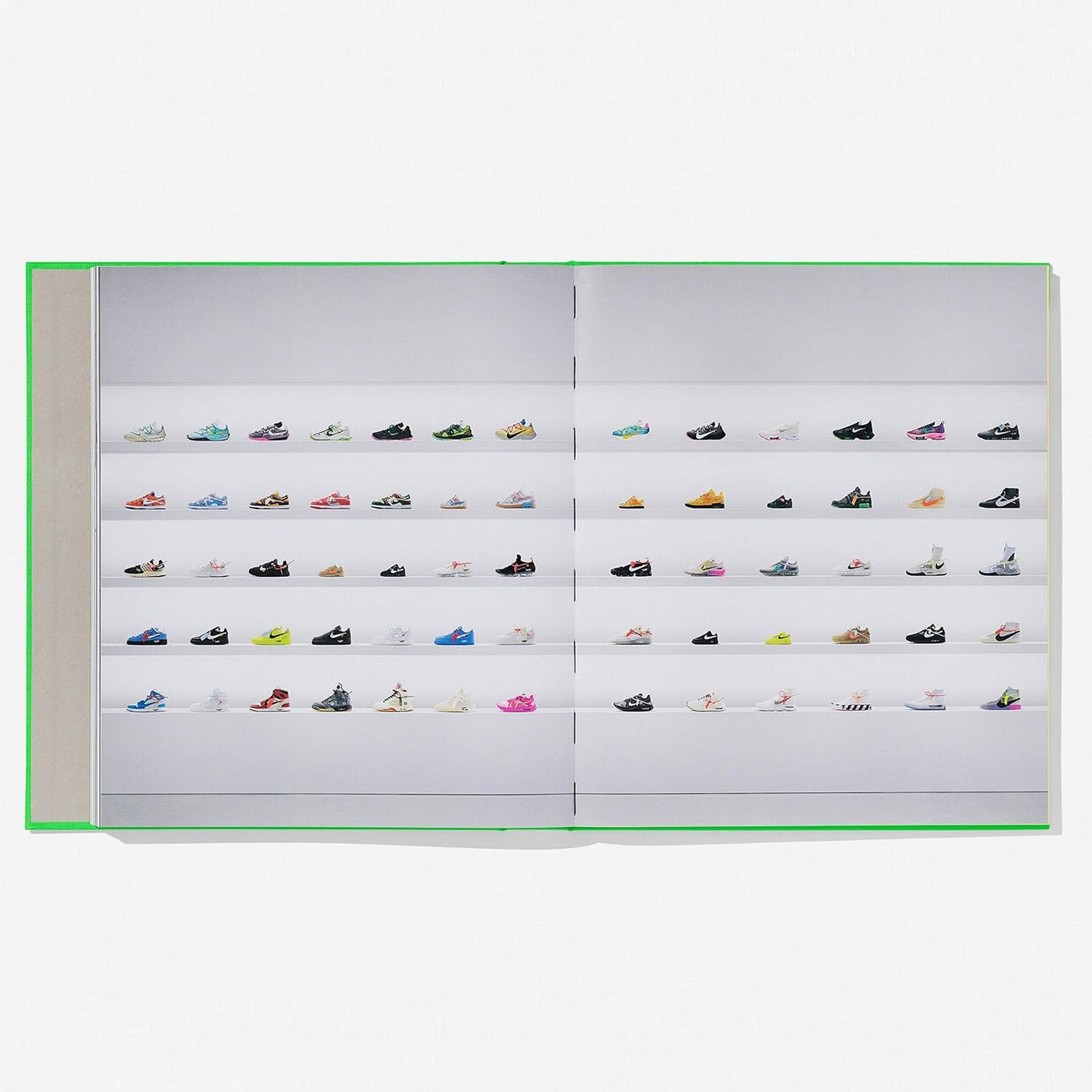 A two-page spread from the art book displaying a comprehensive collection of miniature Off-White c/o Nike sneakers on white shelves, organised in a grid format.