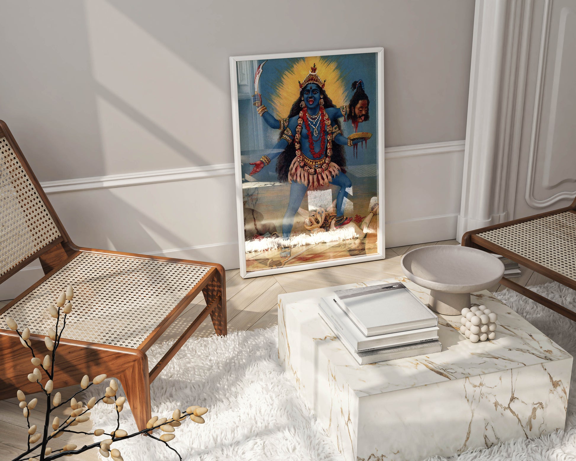 A lifestyle shot of a museum-quality framed print of the Hindu Goddess Kali, by Raja Ravi Varma, enhancing a chic, minimalist luxury home decor scheme.