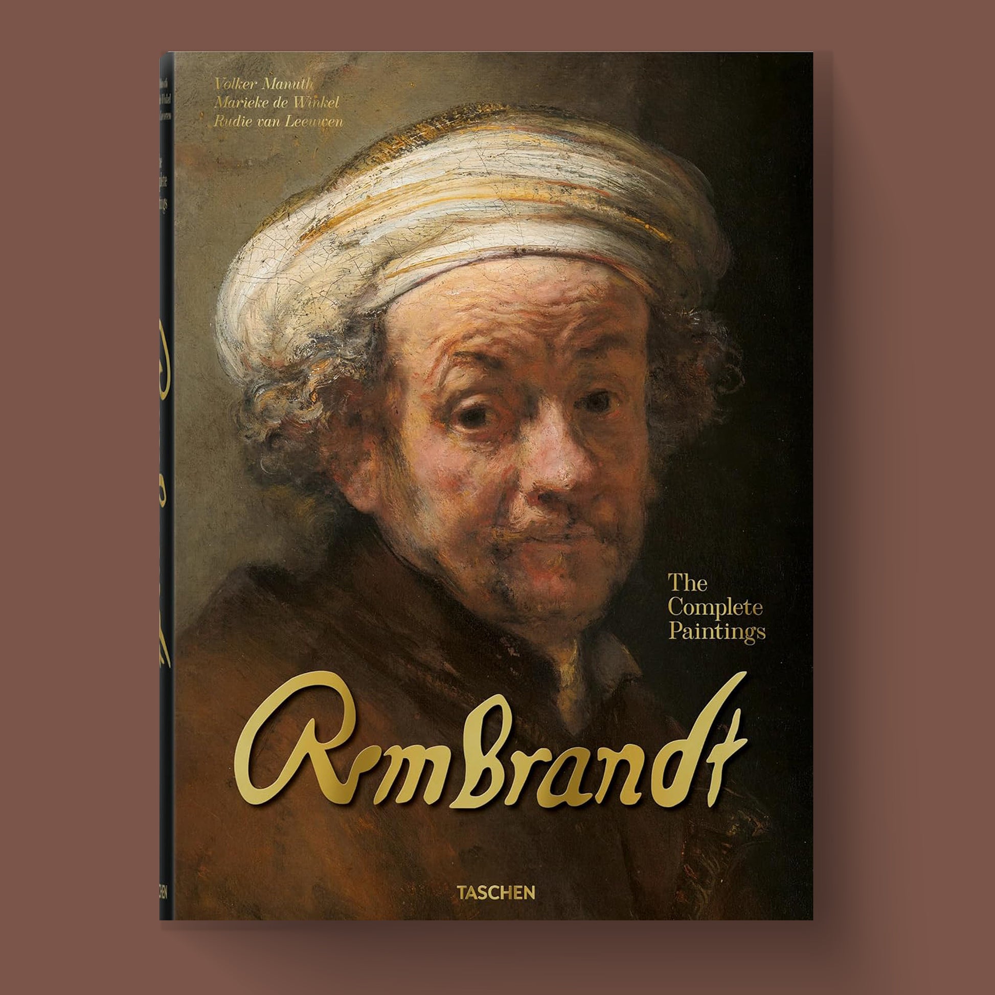 The front cover of "Rembrandt. The Complete Paintings" hardcover art book by Taschen, featuring a close-up portrait of the artist.