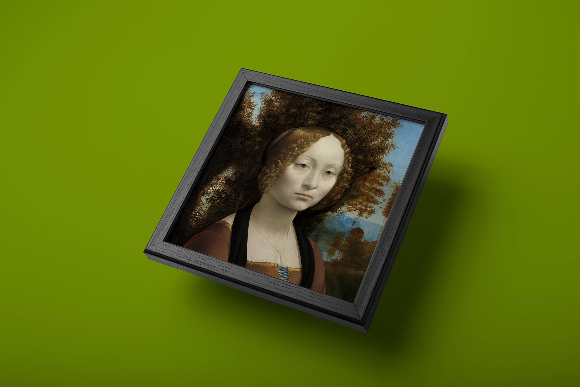 A beautiful and vibrant wall art print of the "Ginevra de' Benci" portrait by Leonardo da Vinci, showcasing the detailed facial expression and juniper background.