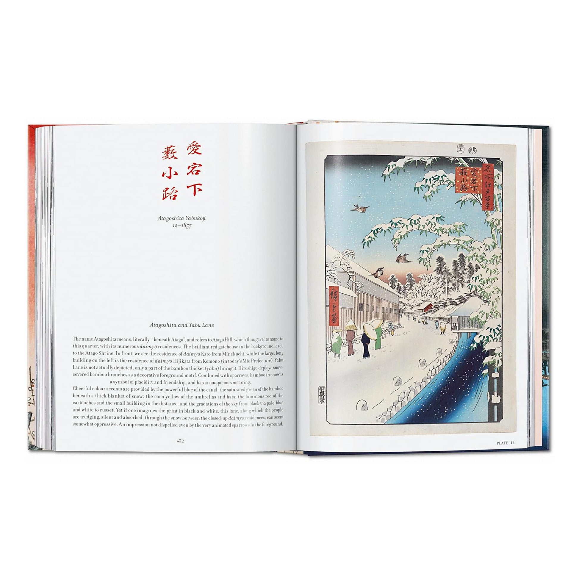 A winter scene from the art book, showing Hiroshige's "Atagoshita and Yabu Lane" print, a classic Japanese woodblock art image of a snowy street with a deep blue canal.