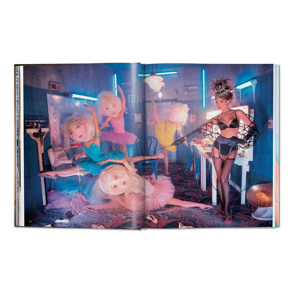 Surreal and vibrant fine art photography by David LaChapelle showing a scene with oversized ballet dolls in a hyper realistic setting.