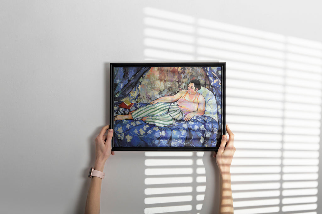 Suzanne Valadon's The Blue Room fine art print in black frame displayed as framed wall art and modern home decor, showcasing iconic feminist artwork with vibrant colours in contemporary interior setting