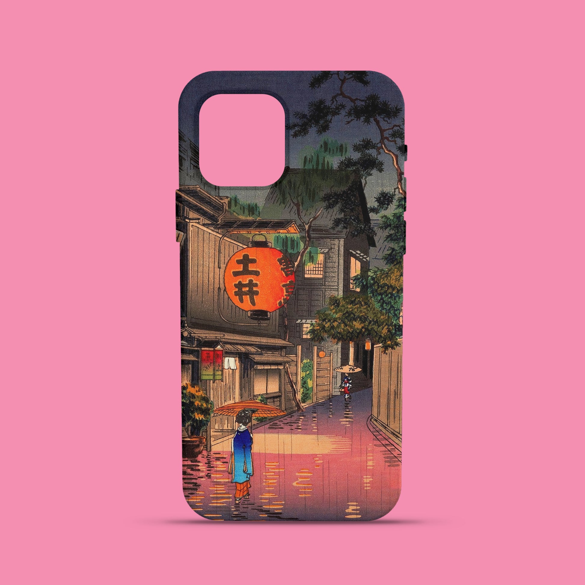 A phone case featuring a Shin-hanga Japanese woodblock print by Tsuchiya Koitsu titled 'Evening at Ushigome.' The art depicts a person with a traditional umbrella walking down a wet, rainy street at night, with warm light from a large red lantern reflecting on the ground.