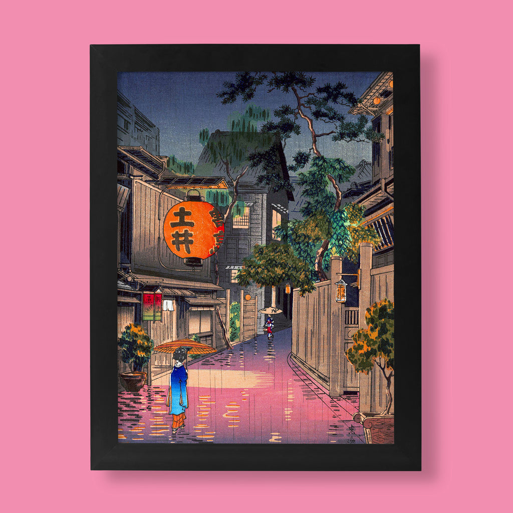 A beautiful Japanese woodblock art print by Tsuchiya Koitsu titled "Evening at Ushigome," depicting a person with an umbrella on a rainy Tokyo street, ideal as a fine art print.