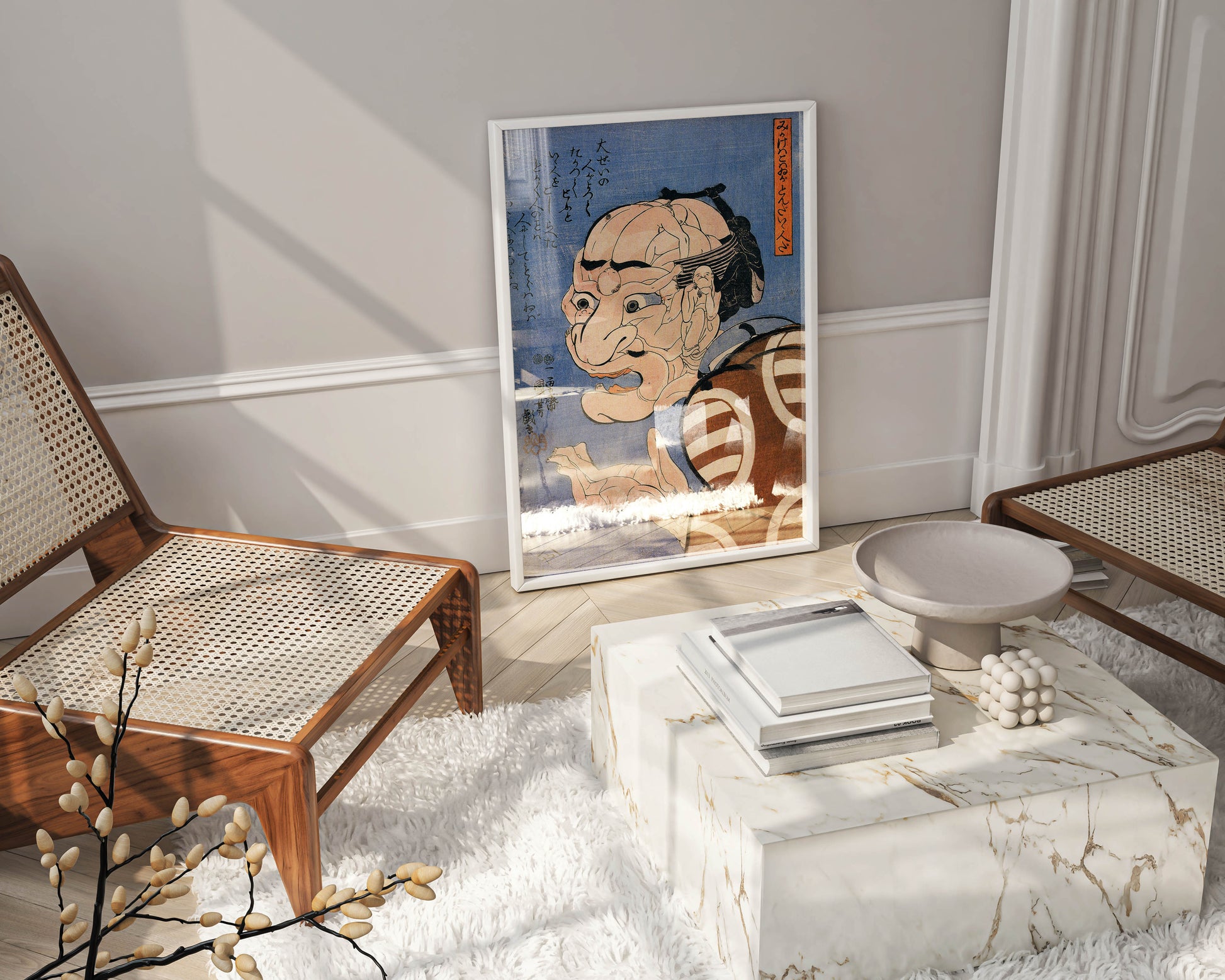 A framed print of the Utagawa Kuniyoshi "At first glance he looks fierce" artwork, leaning against a wall in a modern, minimalist living room. The Japanese art print serves as stylish wall art above a marble coffee table, complementing the surrounding interior design with its classic ukiyo-e style and rich colours.