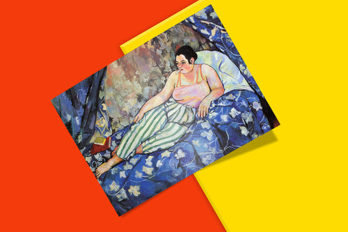 Detail from Suzanne Valadon's The Blue Room art print showing the female figure in coral camisole and striped trousers against floral blue bedding, gallery-quality fine art poster