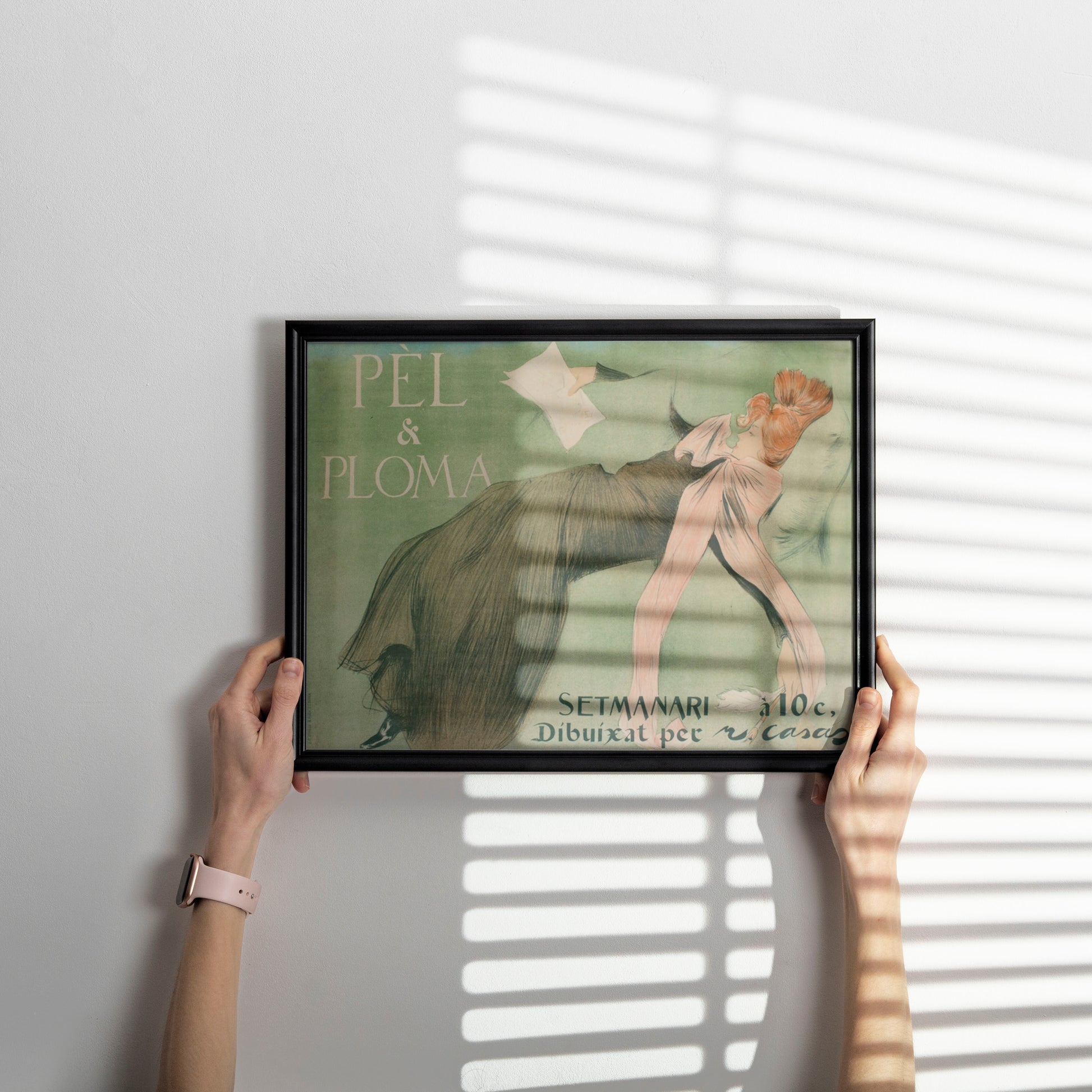 Framed Ramon Casas Art Nouveau print featuring elegant woman with paintbrush and pen in sophisticated gallery wall display