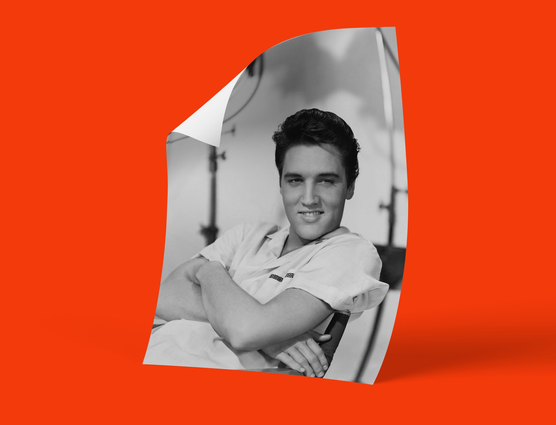 Vintage photograph of Elvis Presley, the King of Rock and Roll, in a iconic pose, perfect for a high quality art print or framed wall art.