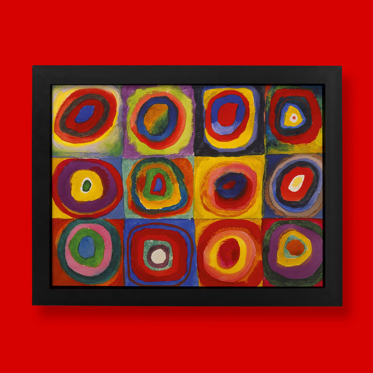 A framed abstract painting featuring a 3x4 grid of colorful concentric oval shapes in red, yellow, blue, green, purple, and orange, set in a black frame against a solid red background.