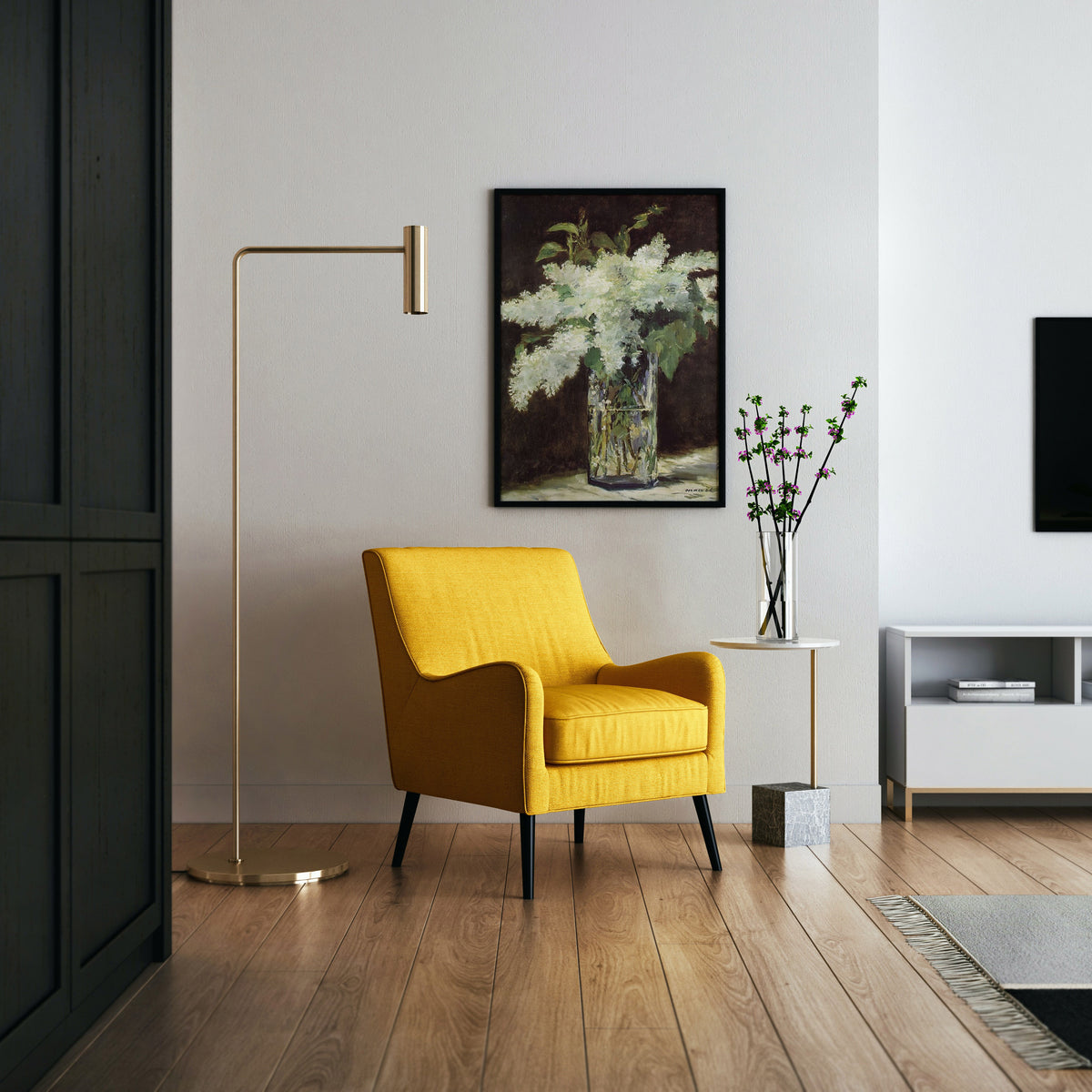 A framed art print depicting white flowers in a glass vase, hung on a light gray wall above a yellow armchair in a modern living room setting.