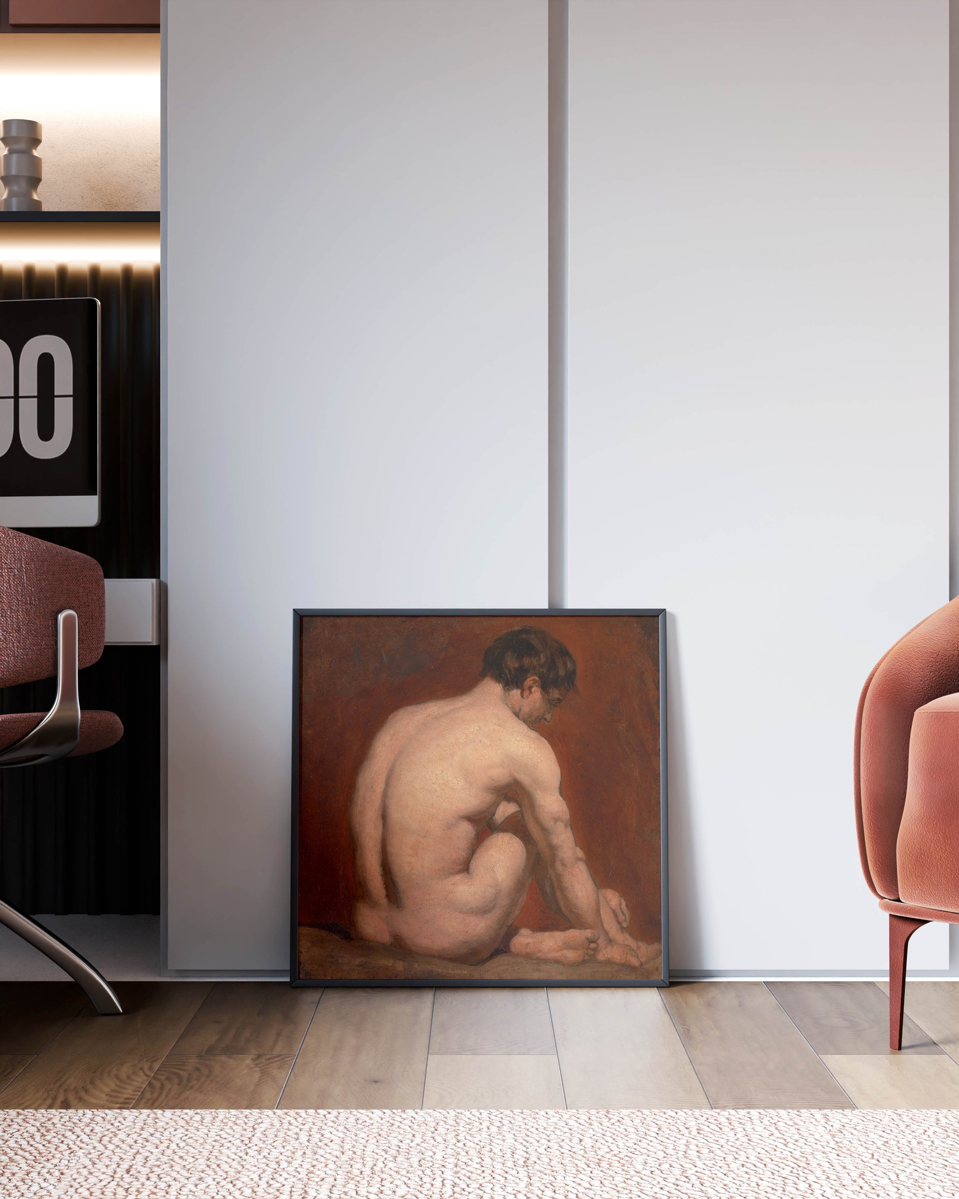 A high-quality framed print of William Etty's Male Nude, Kneeling, from the Back, leaning on a modern office wall, adding a touch of classic fine art to a professional interior.
